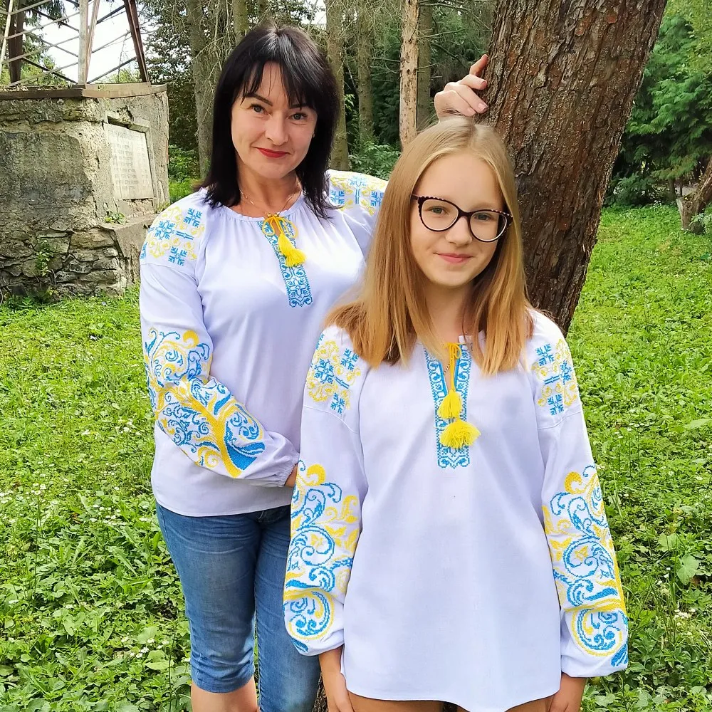 Children's embroidered blouse with yellow and blue embroidery
