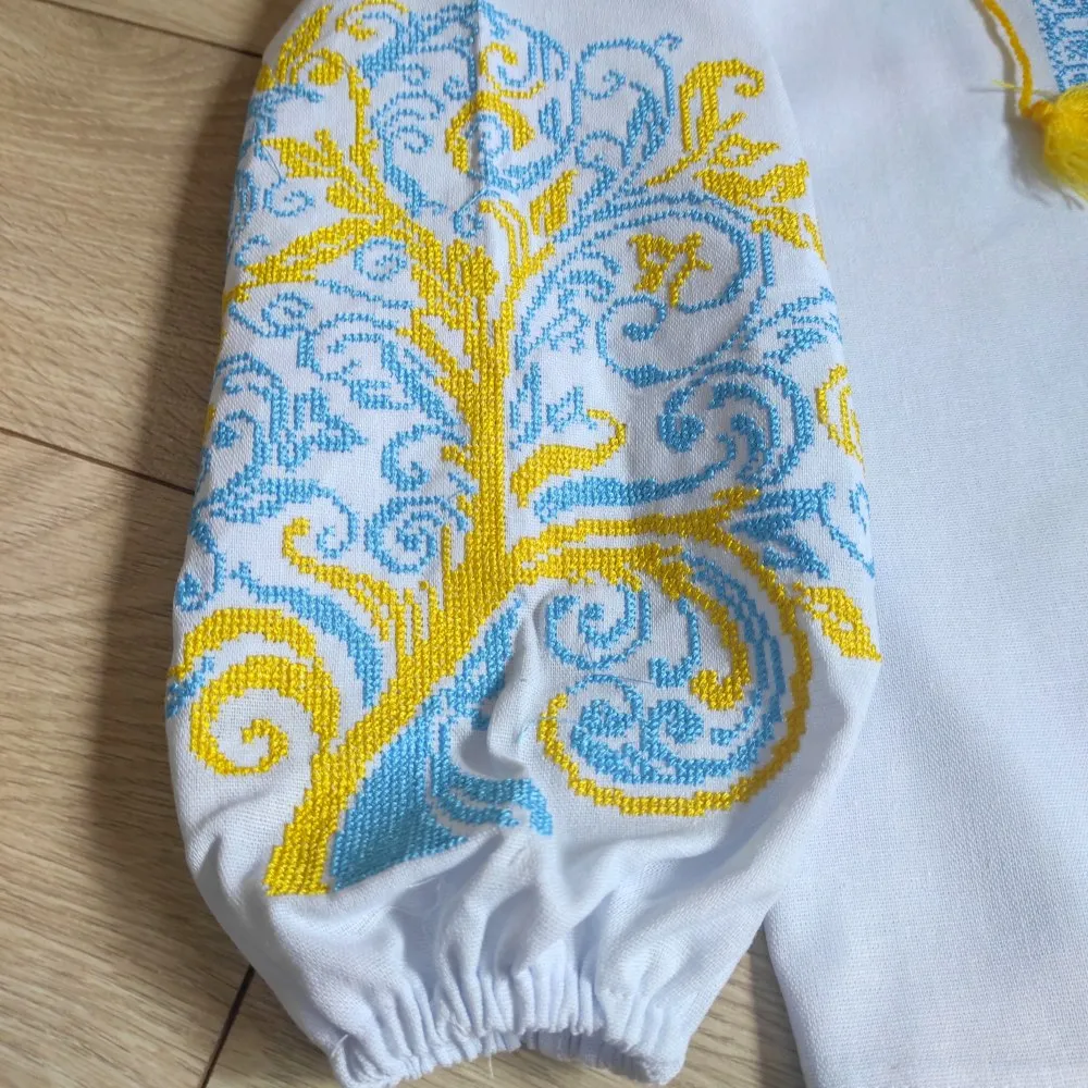 Children's embroidered blouse with yellow and blue embroidery